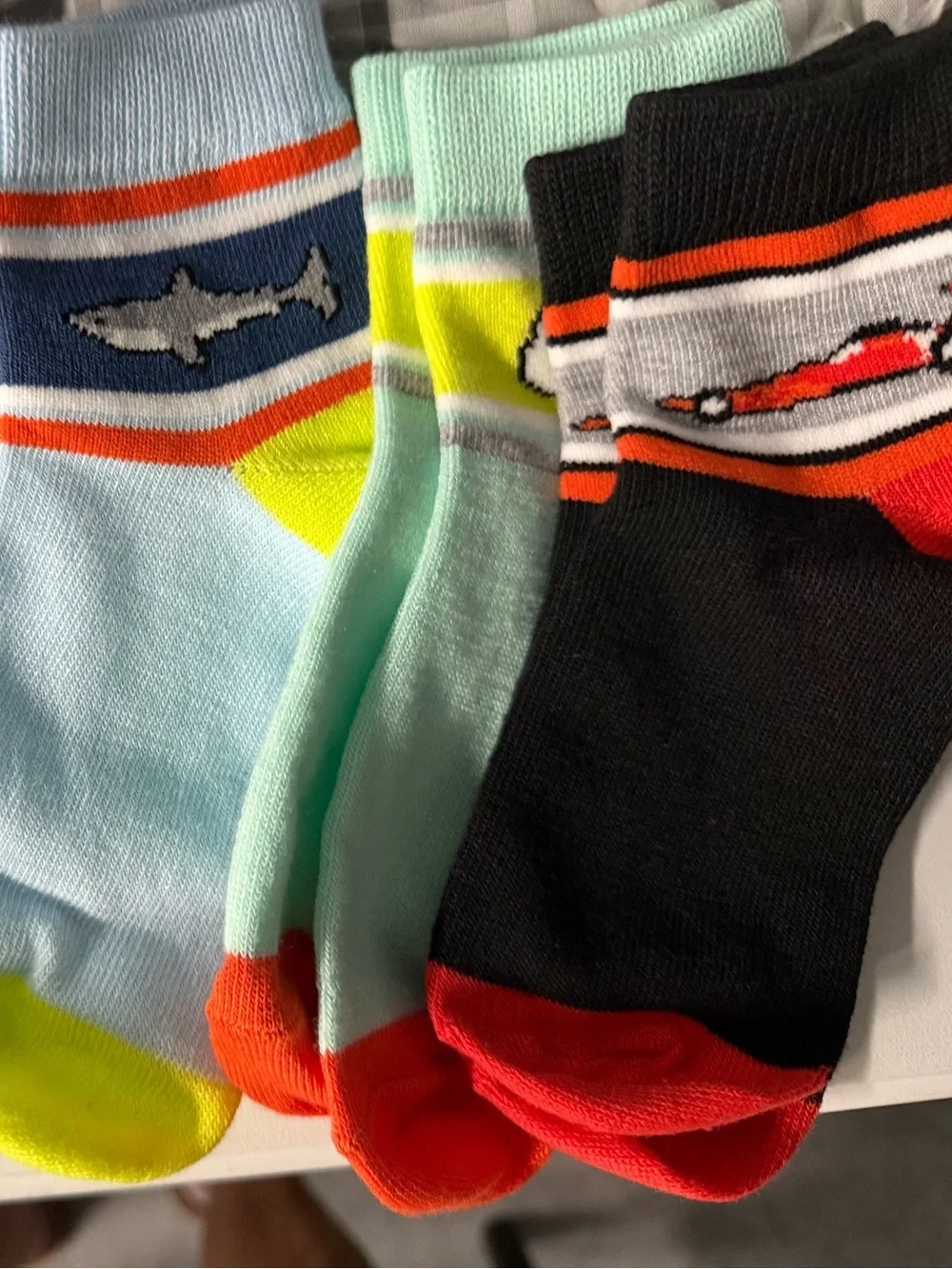 Five pair of boys socks, unbranded open package 6 inches from toe to heel